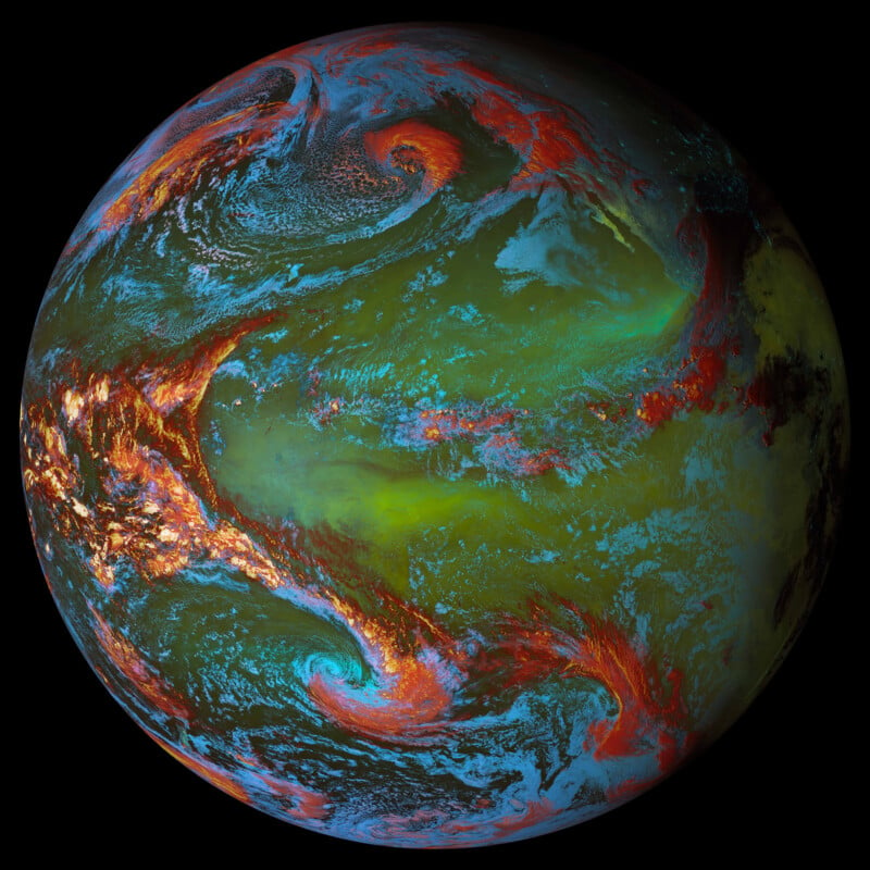 A vividly enhanced image of Earth shows swirling clouds and weather patterns in striking shades of red, blue, green and yellow. The exaggerated colors highlight atmospheric circulation and other weather features against the black backdrop of space.