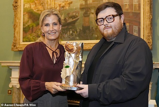 The Duchess presented London-based menswear designer Steven Stokey-Daley (left) with the British Fashion Council's Queen Elizabeth II Award for British Design