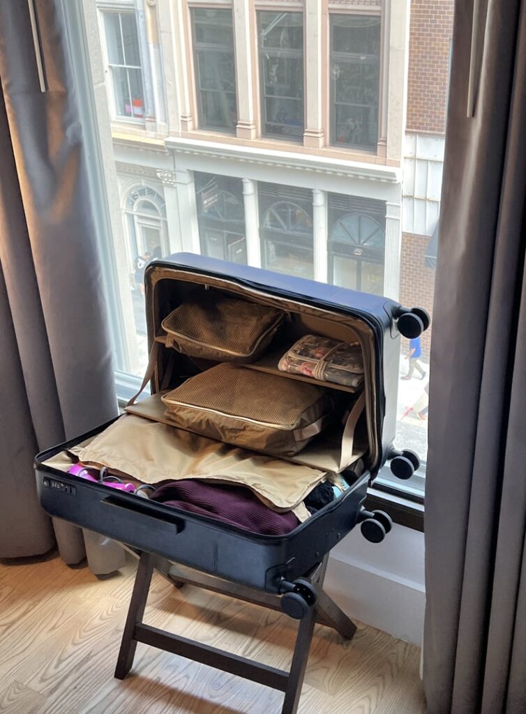 My favorite suitcase has built-in shelves that make traveling more efficient.